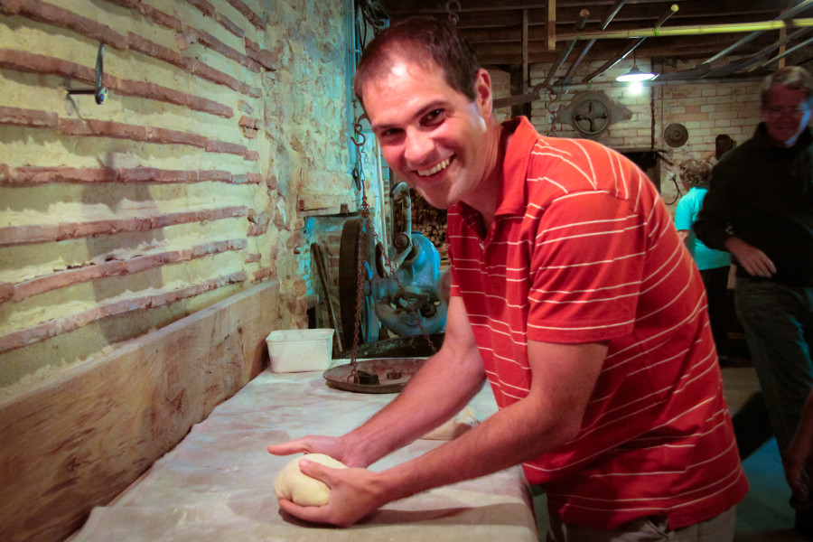 Happy man kneading the dough, page Bordeaux tour