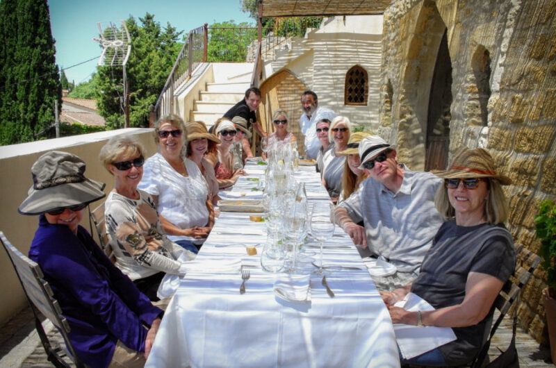 Happy people posing in the restaurant - Provence tour