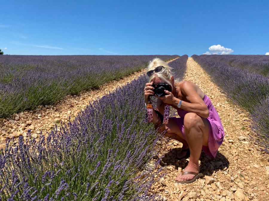 Christy taking a picture of lavender