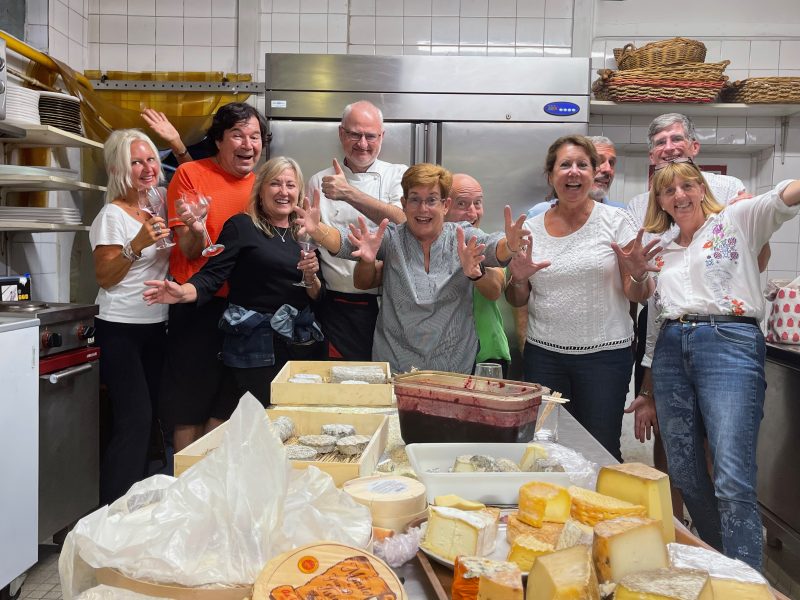 Happy people on a cookin Loire Valley cooking class. Tasting a lot of different cheeses. Page - 2023 Loire Valley Tour dates