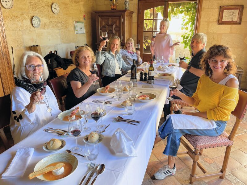 Christy, the founder of France Off the Beaten Path™, enjoys wine-tasting with her tour quests. check out 2024 Bordeaux Tour Dates
