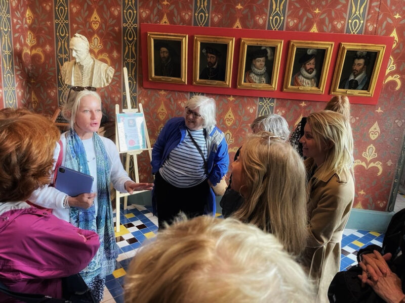 guiding guests at chateau de Blois during a Loire Valley tour