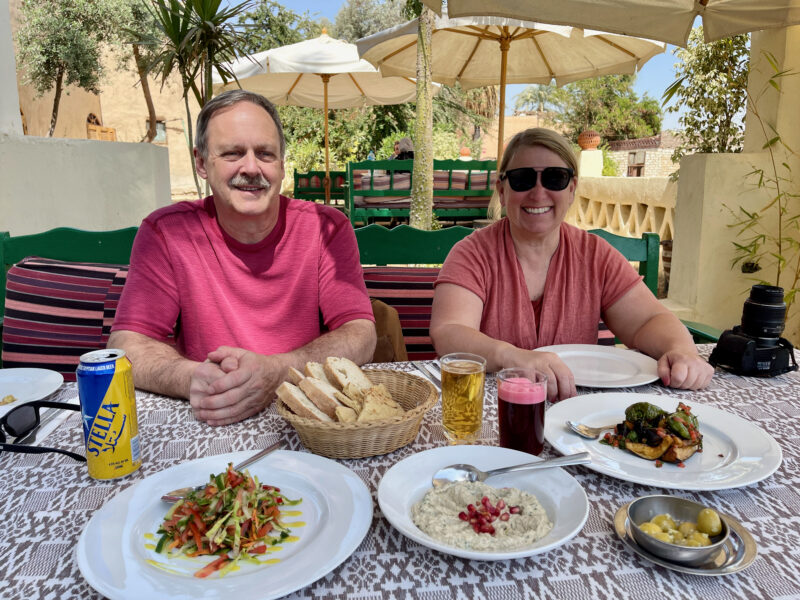 tour guests at lunch in Medinet Habu, Egypt tour