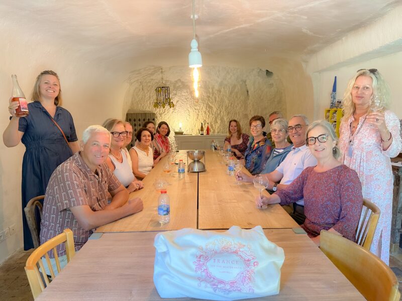 Guests enjoying our winery tour and tasting at friends Fred and Louisa's estate during France off the Beaten Path Loire Valley tour.