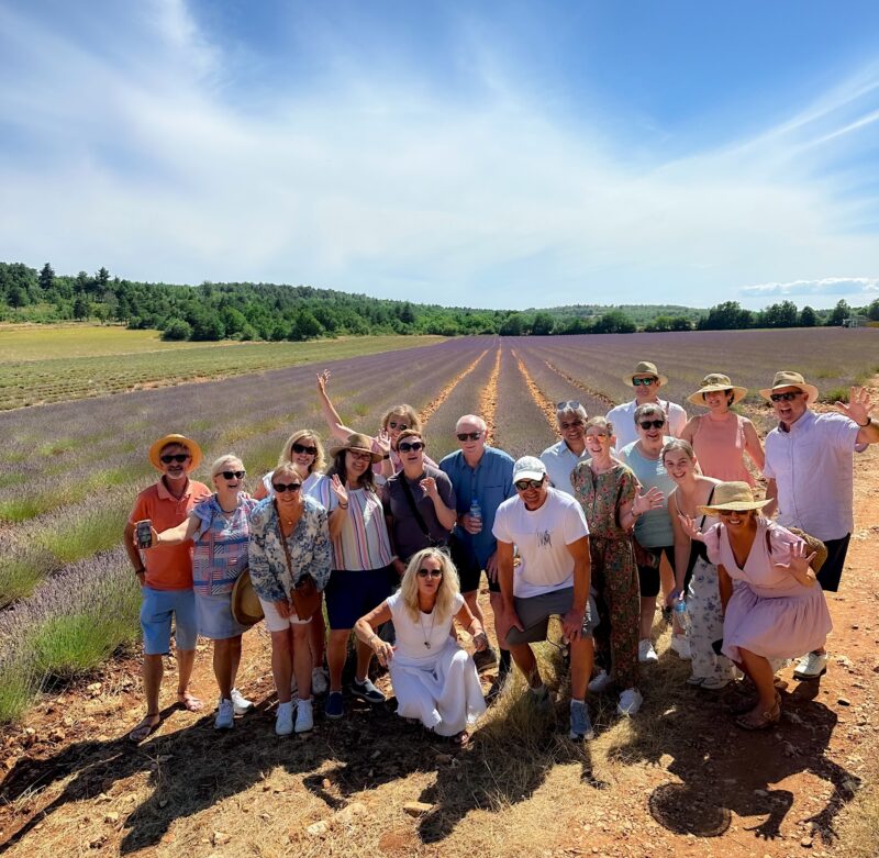 July 2025 tour guests in the lavender fields during France Off the Beaten Path Provence tour.