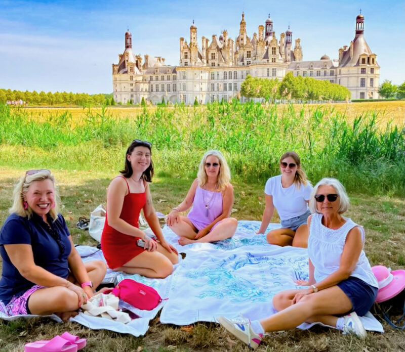 Enjoying the view during an impromptu picnic at Chambord castle during LOire Valley tour