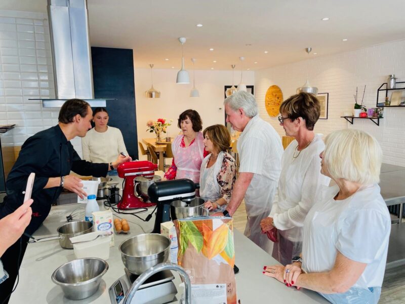 Guests during pastry class during France Off the Beaten Path Champagne tour.