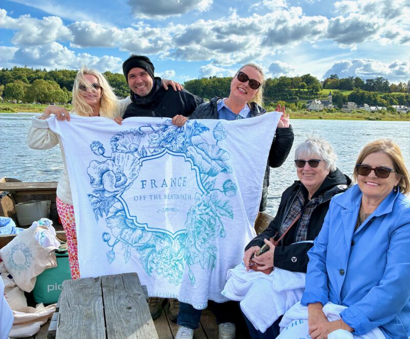 Founder Christy Destremau with her team Aurelien and Summer along with guests floating down the river during France Off the Beaten Path Loire Valley tour.