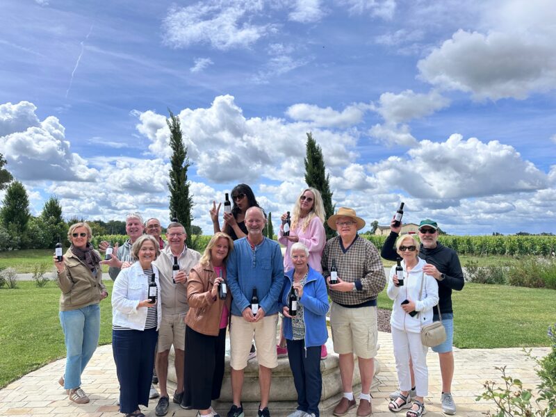 Tour guests at our wine blending workshop and private lunch at the winery during France Off the Beaten Path Bordeaux Tour.