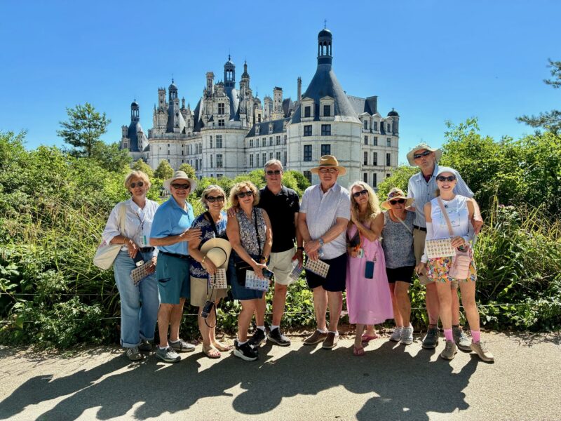 Loire Valley tour guests enjoying our visit at Chambord castle during France Off the Beaten Path Loire Valley tour.