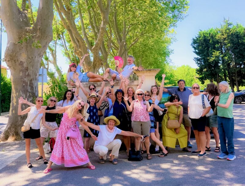 July 2026 tour guests at lunch in the countryside during France Off the Beaten Path Provence tour.