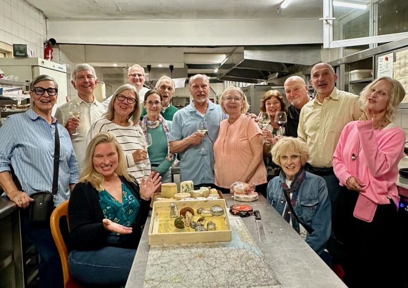 Loire Valley tour guests having fun during cooking class and cheese tasting with French friend, Chef Damien
